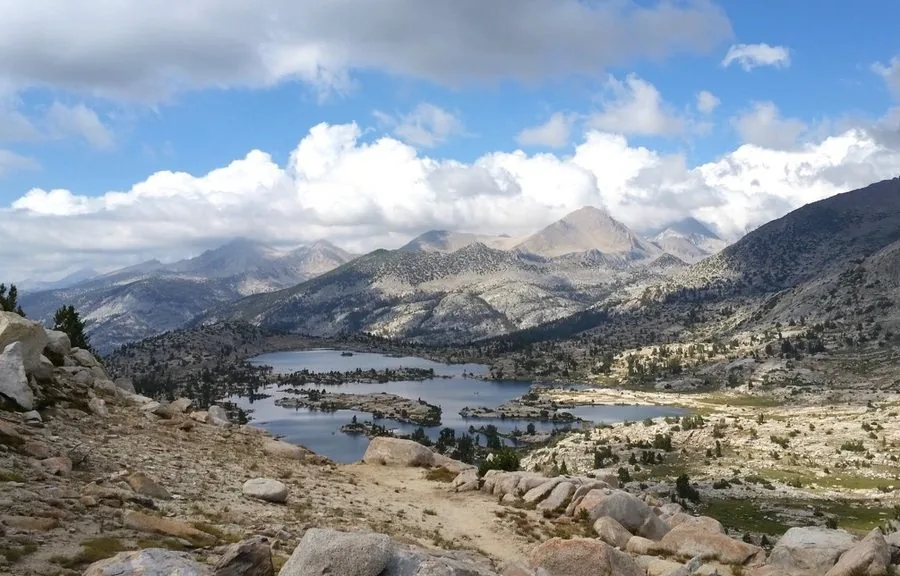 Renée Klorman at Marie Lakes, Sierra Nevada, California — a granite-edged alpine lake on the John Muir Trail